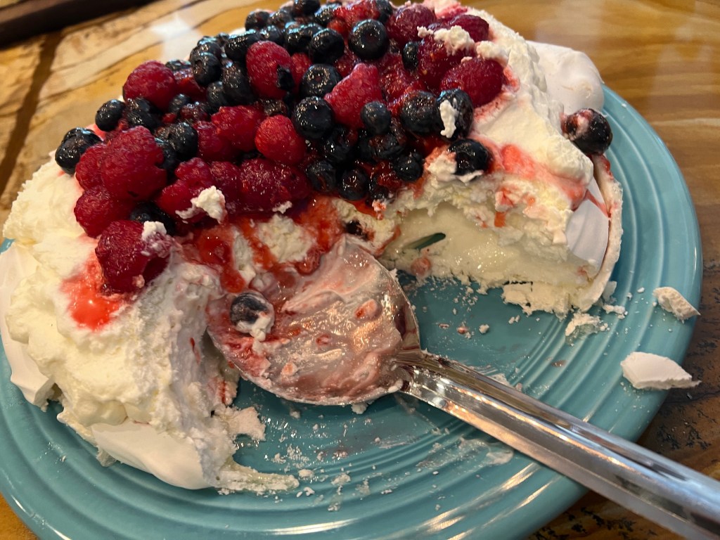 Dig into the Pavlova with fruit - Copyright morethanafoodie.com