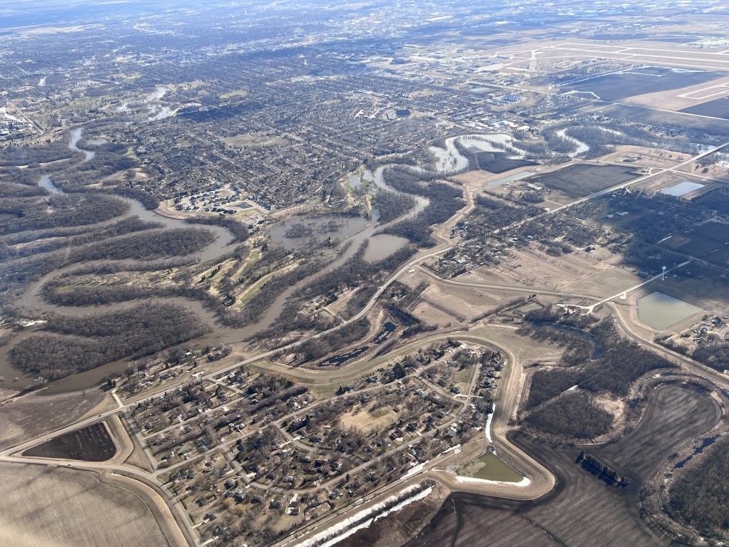 The Red River of the North. Ariel View of the boarder of Fargo, ND and Moorhead, MN - 2023.